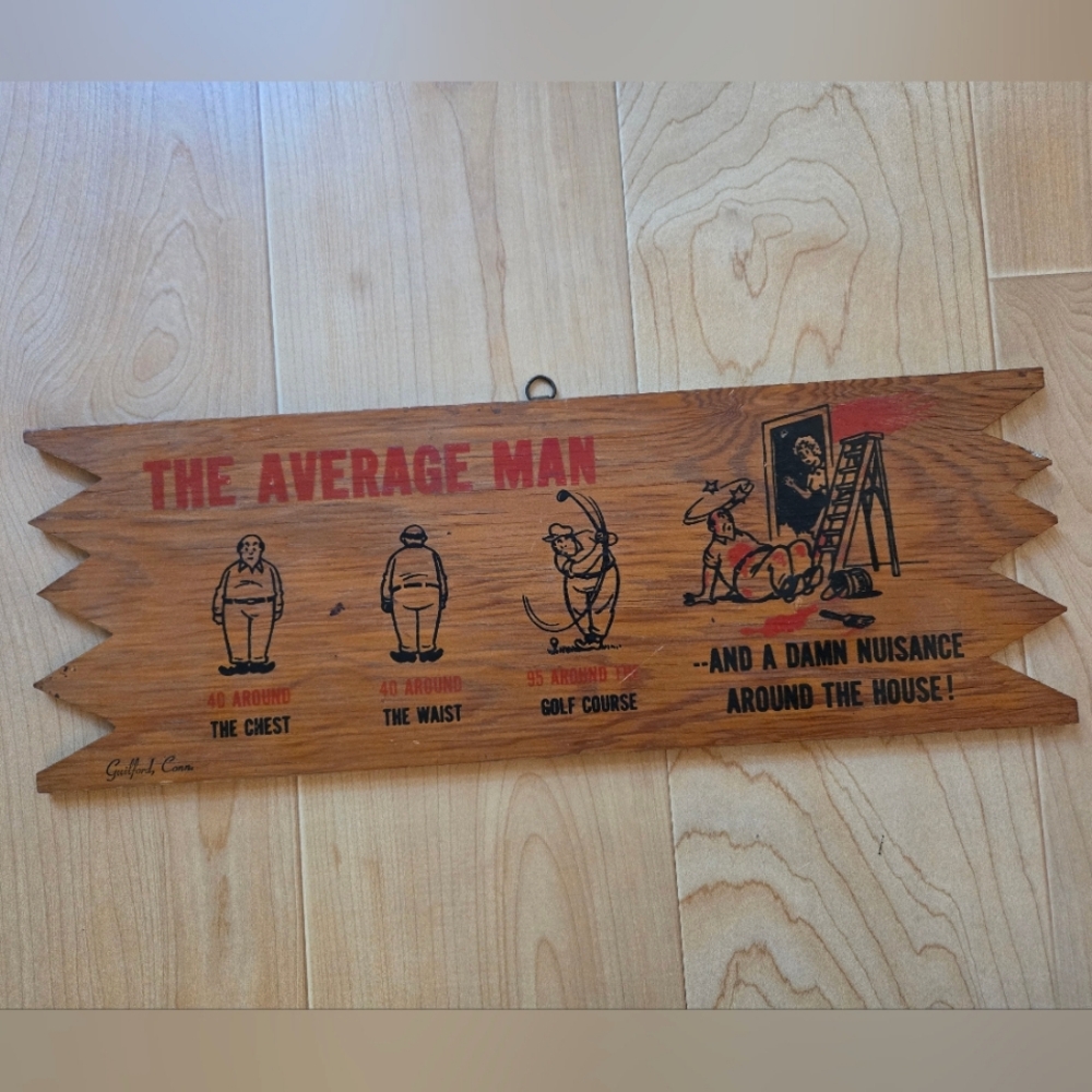Vintage 1950s (1955) funny wood hanging sign "The Average Man"